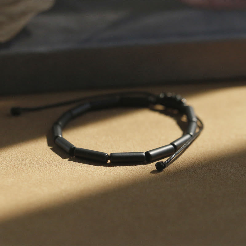 Pulsera de protección de soporte de cuentas de ónix negro con Buddha Stones