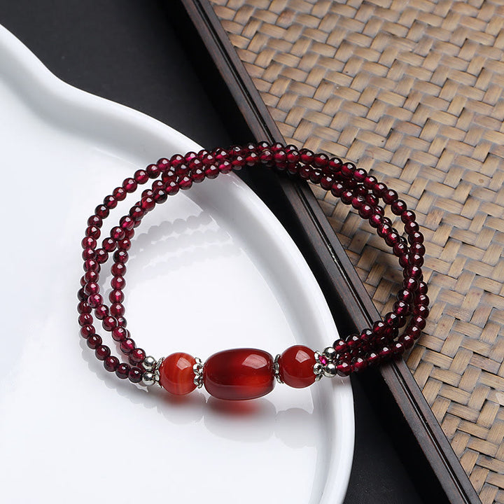Pulsera de triple capa con protección de ágata roja granate natural con Buddha Stones