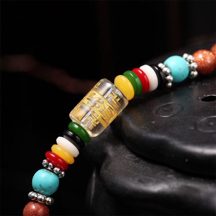 Buddha Stones 108 cuentas Mala Goldstone Om Mani Padme Hum esvástica pulsera de confianza
