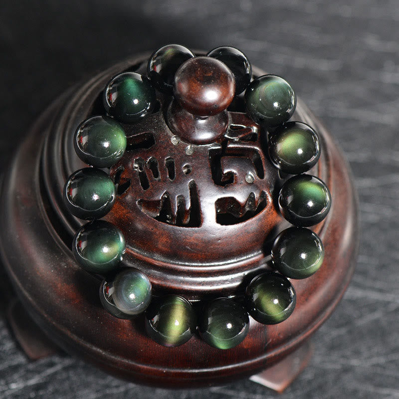 Pulsera de riqueza de obsidiana de ojo verde natural con Buddha Stones