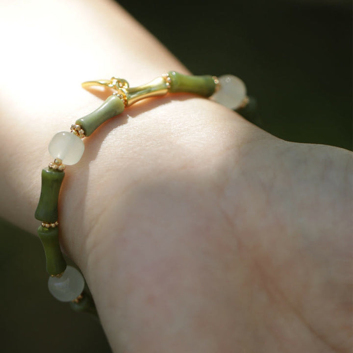 Pulsera de riqueza con Buddha Stones, bambú verde, jade, lirio de los valles