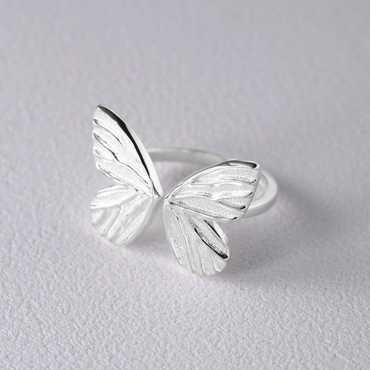 Anillo de libertad de amor con mariposa de plata de ley 925 con Buddha Stones
