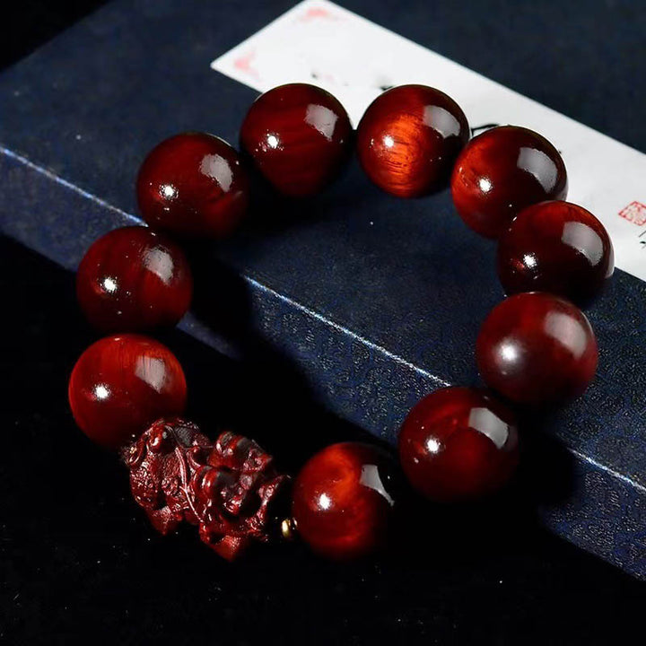 Pulsera de protección PiXiu de sándalo rojo de hoja pequeña con Buddha Stones