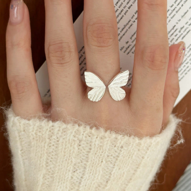 Anillo de libertad de amor con mariposa de plata de ley 925 con Buddha Stones