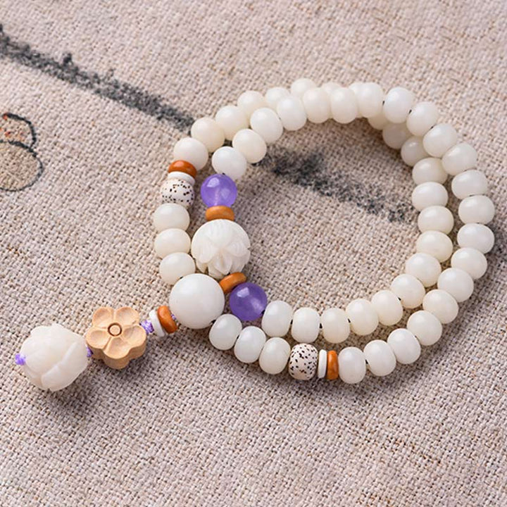 Pulsera de bendición de loto Bodhi de jade blanco tibetano con Buddha Stones