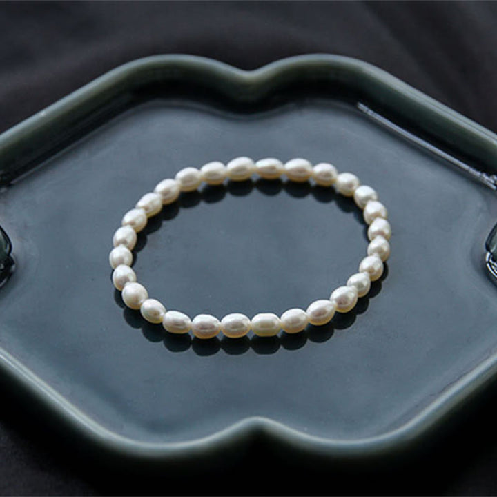 Pulsera con cuentas curativas de perlas naturales de Buddha Stones