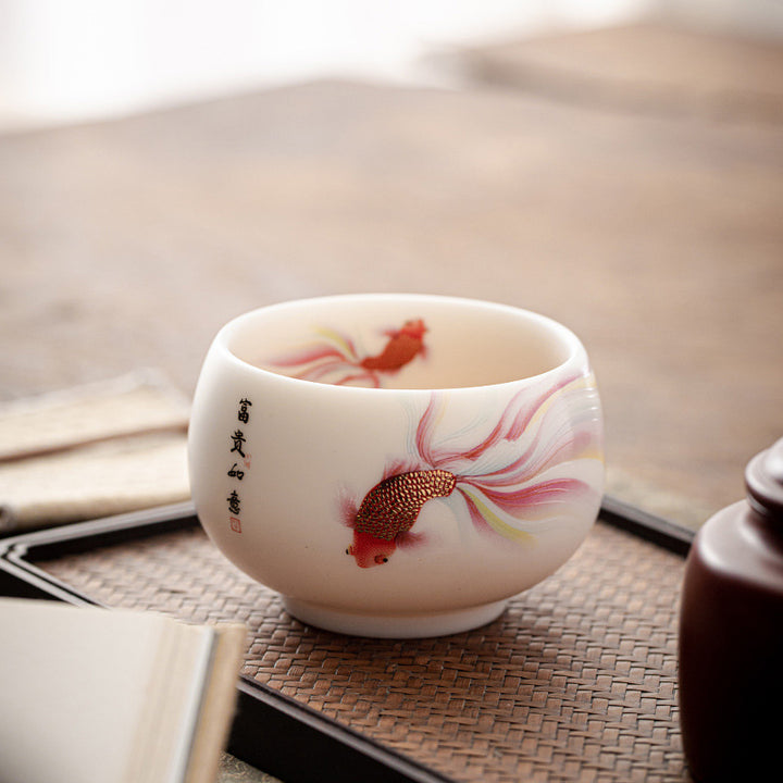 Taza de té de cerámica de porcelana blanca, pez Koi, Buddha Stones, taza de té de Kung Fu