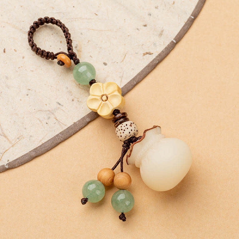 Llavero de prosperidad y bendición de flores, bolsa de dinero con semillas de Bodhi Natural, Buddha Stones