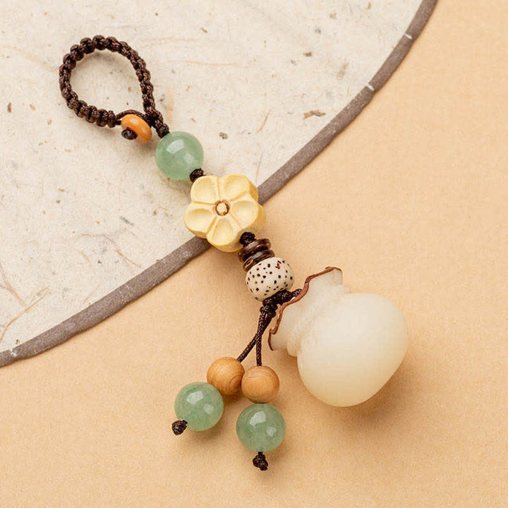 Llavero de prosperidad y bendición de flores, bolsa de dinero con semillas de Bodhi Natural, Buddha Stones