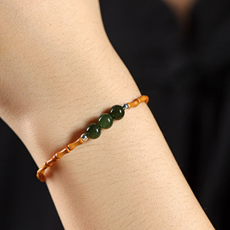Pulsera de la suerte con cuentas de jade hetiano con patrón de bambú de oliva natural con Buddha Stones