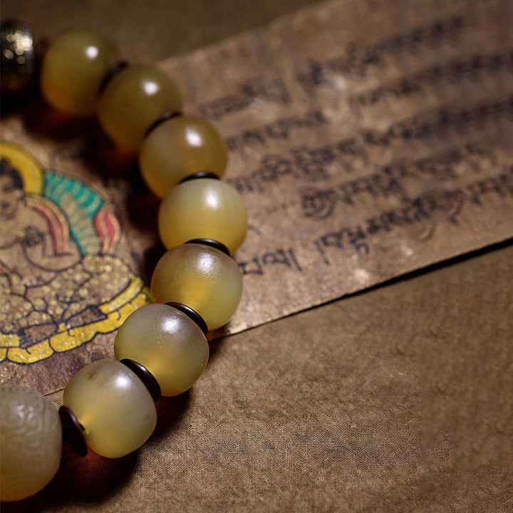 Pulsera auspiciosa hecha a mano con Buddha Stones, cuerno de oveja tibetano Om Mani Padme Hum