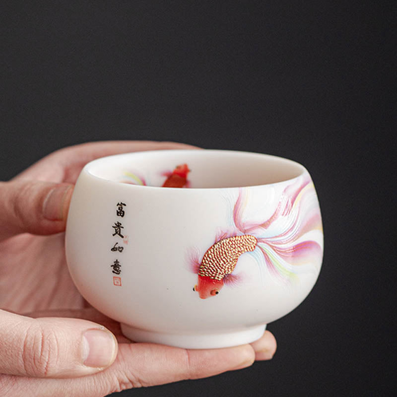 Taza de té de cerámica de porcelana blanca, pez Koi, Buddha Stones, taza de té de Kung Fu