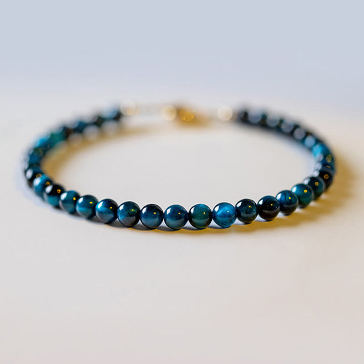 Pulsera de cadena de protección con piedra de ojo de tigre azul natural de Buddha Stones