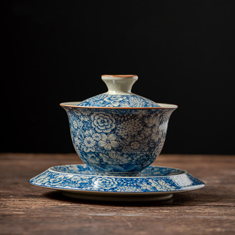 Buddha Stones azul y blanca vintage Flor de durazno Loto Peonía Cerámica Gaiwan Sancai Taza de té Kung Fu Taza de té y platillo con tapa