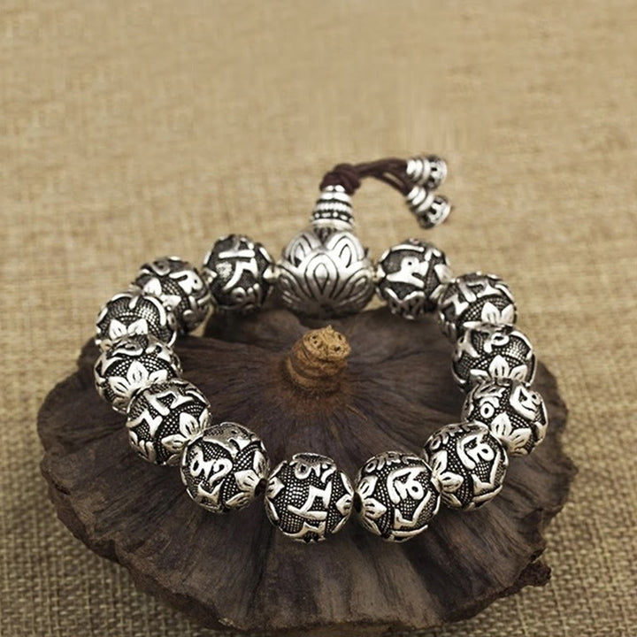 Pulsera de amuleto de cuentas de aleación tallada Om Mani Padme Hum tibetano con Buddha Stones