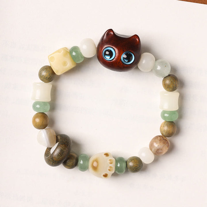 Buddha Stones, semillas de Bodhi, sándalo verde, madera de ébano, hoja pequeña, sándalo rojo, cabeza de gato, garra de pata, pulsera de la paz - image 12