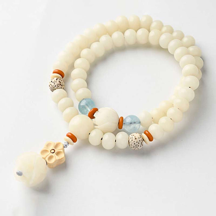 Pulsera de bendición de loto Bodhi de jade blanco tibetano con Buddha Stones