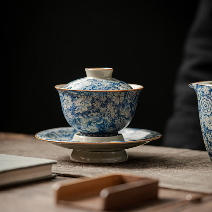 Buddha Stones azul y blanca vintage Flor de durazno Loto Peonía Cerámica Gaiwan Sancai Taza de té Kung Fu Taza de té y platillo con tapa