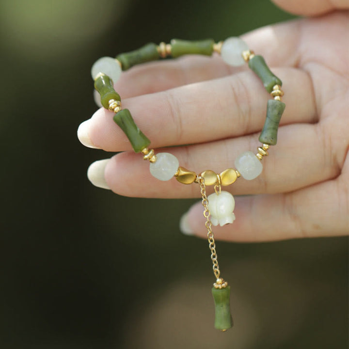 Pulsera de riqueza con Buddha Stones, bambú verde, jade, lirio de los valles