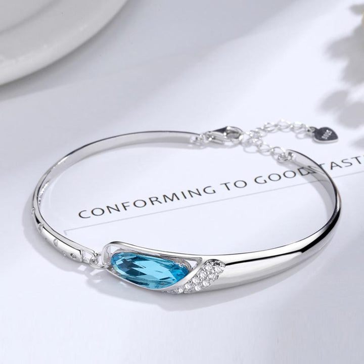 Pulsera con dijes de las 12 constelaciones del zodíaco de cobre bañado en plata 925 con Buddha Stones