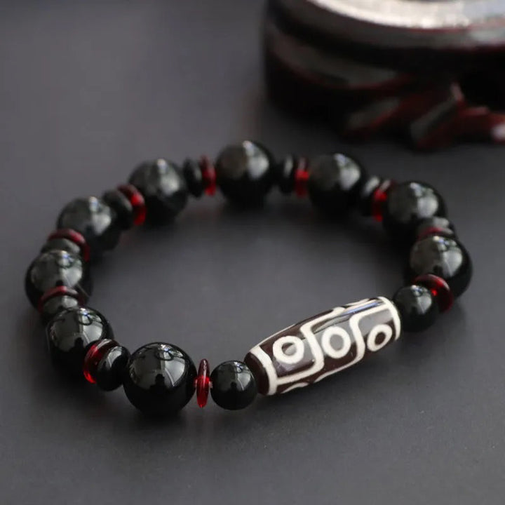 Pulsera de protección de la riqueza con cuentas Dzi de nueve ojos de ónix negro y Buddha Stones