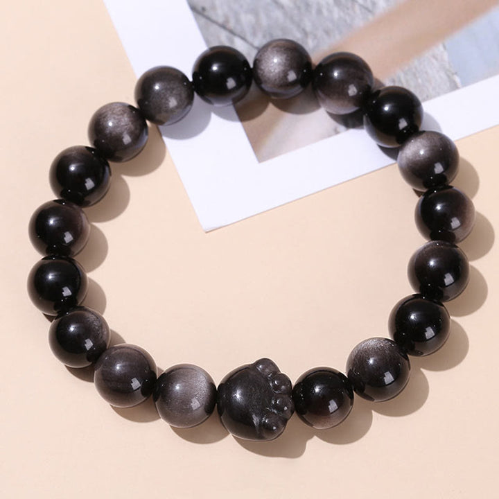 Buddha Stones Oro Natural Brillo Obsidiana Plata Brillo Obsidiana Linda Pata de Gato Garra Riqueza Pulsera - Obsidiana con brillo plateado - 10 mm - image 8