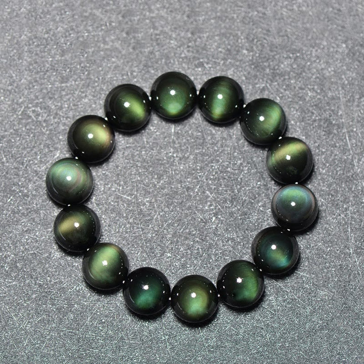 Pulsera de riqueza de obsidiana de ojo verde natural con Buddha Stones - image 1