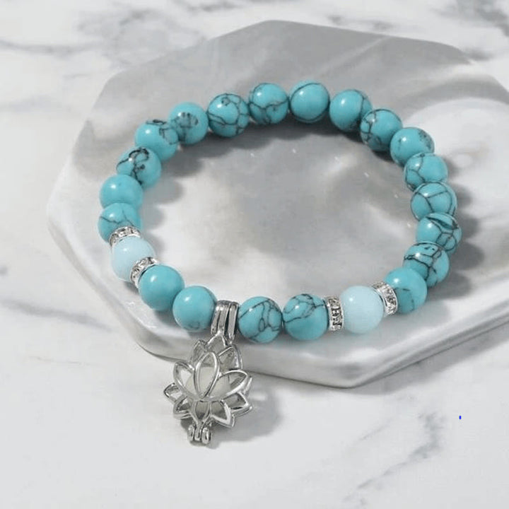 Pulsera de protección de loto con cuentas luminosas de piedra brillante turquesa tibetana de Buddha Stones