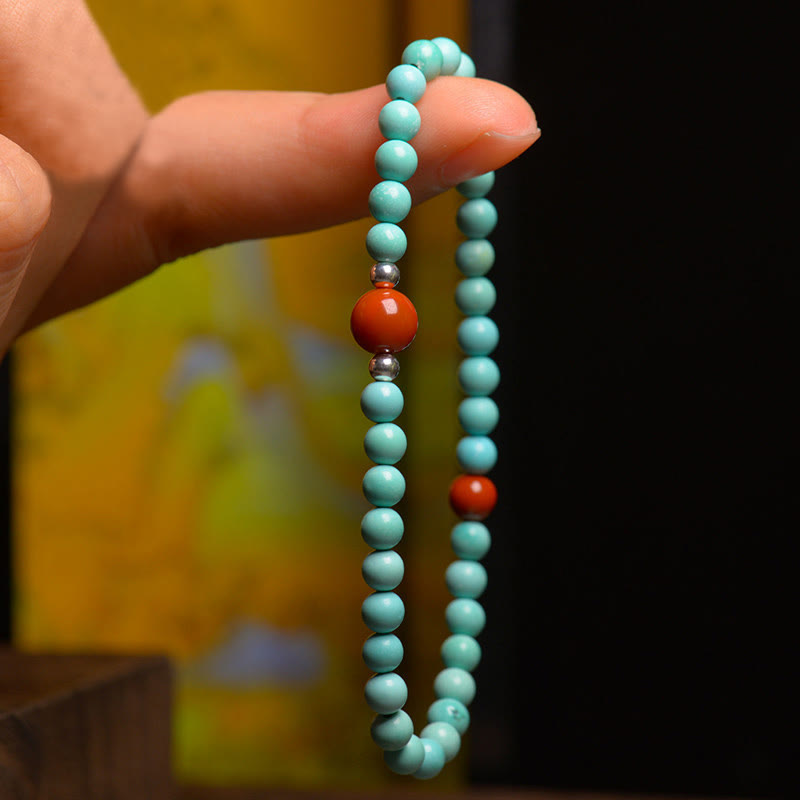 Pulsera de protección de cuentas de ágata roja turquesa de Buddha Stones - image 2