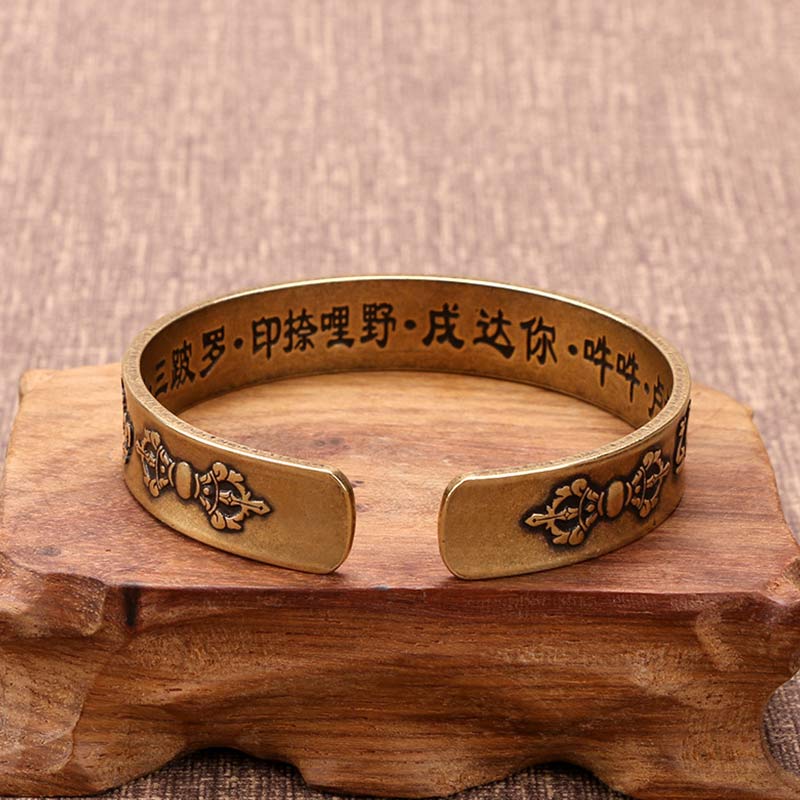Buddha Stones Pulsera de curación de latón y cobre con mantra tibetano Mahāpratisarā en sánscrito
