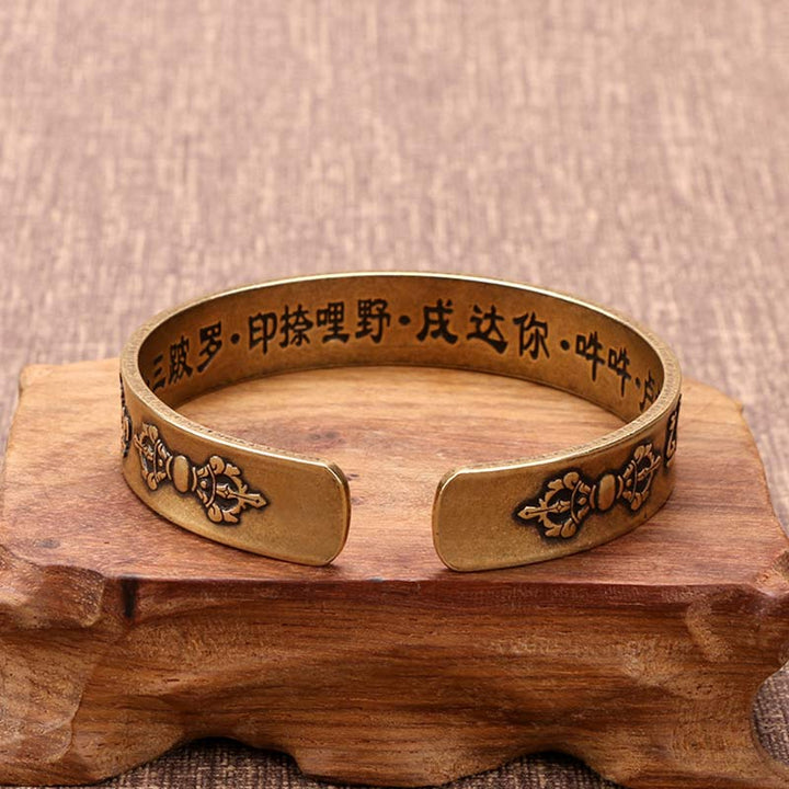 Buddha Stones Pulsera de curación de latón y cobre con mantra tibetano Mahāpratisarā en sánscrito