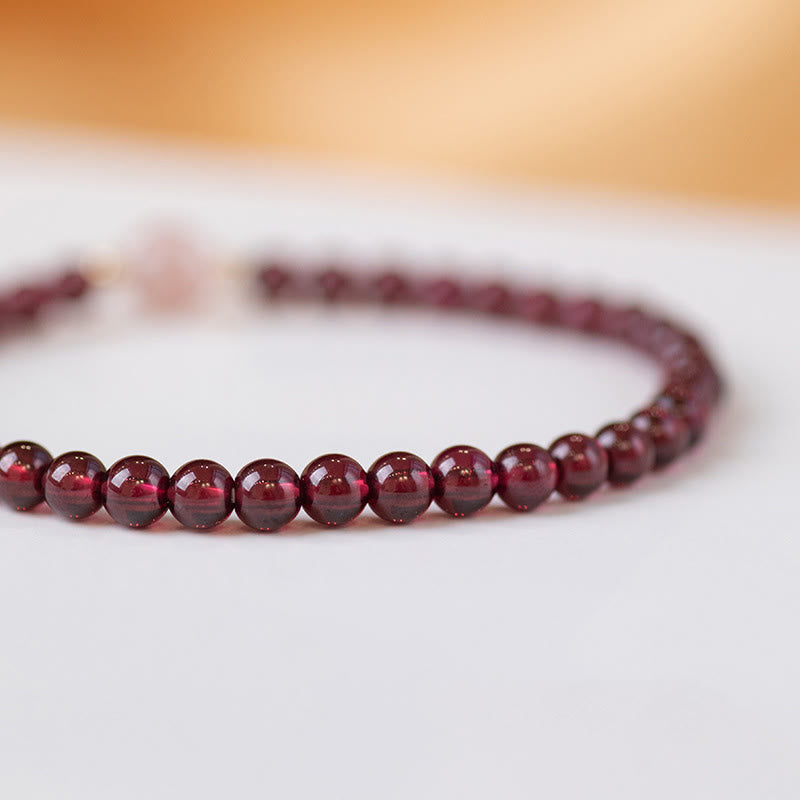 Pulsera Calma de Cuarzo Fresa Granate Natural de Piedras de Buddha Stones