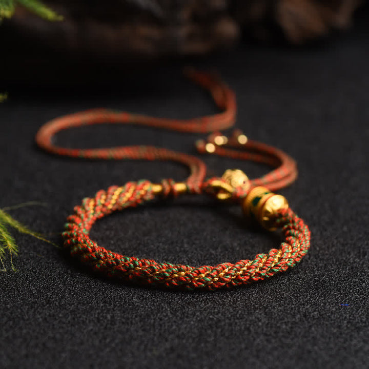 Pulsera de cuerda colorida con cuentas de rueda de oración de la suerte hecha a mano tibetana con Buddha Stones