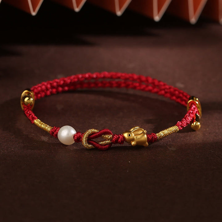 Pulsera trenzada de la suerte con perlas de conejo y mango de Ruyi del deseo de oro de 24 quilates con Buddha Stones - Perla de conejo en oro de 24 quilates (circunferencia de la muñeca: 14-19 cm) - image 10