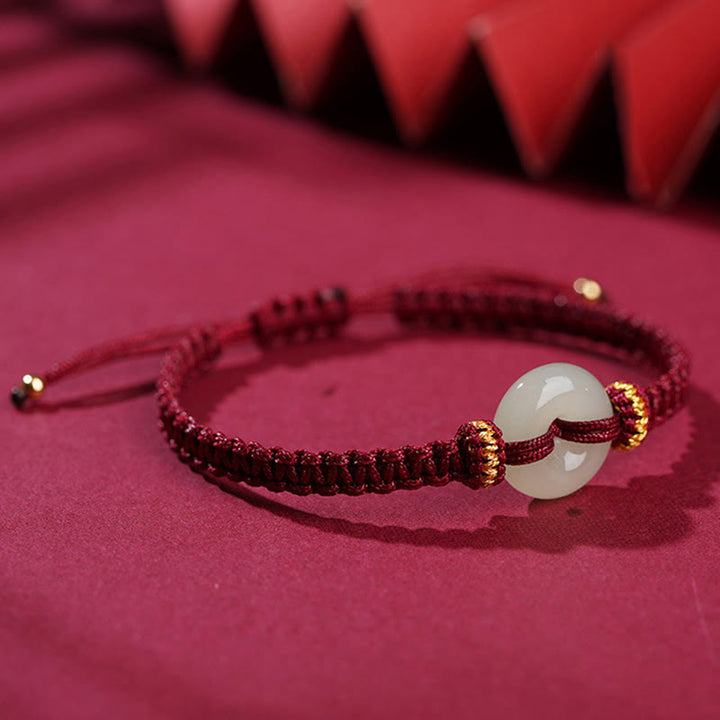 Pulsera trenzada de abundancia de jade con hebilla de paz de Buddha Stones
