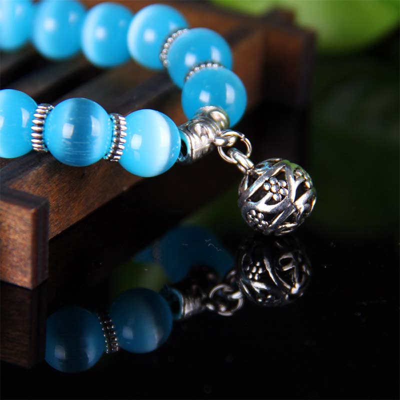 Pulsera de la suerte con ojo de gato tibetano y Buddha Stones