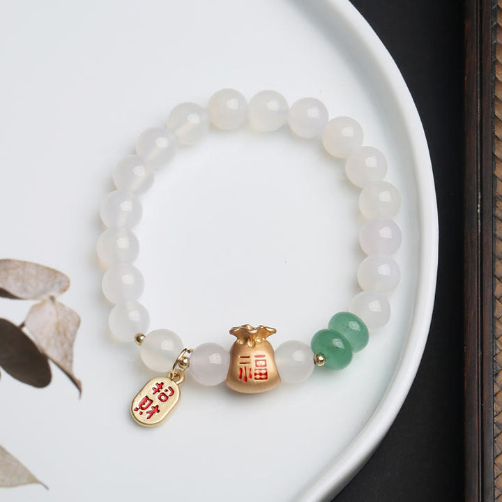 Buddha Stones Ágata blanca natural Ágata roja Bolsa de dinero Personaje Fu Pulsera de protección de trébol de cuatro hojas