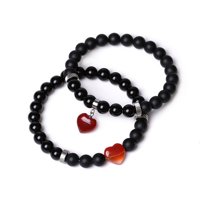 Buddha Stones 2 piezas de piedra de cristal de ónix negro amor protección del corazón pulsera de pareja