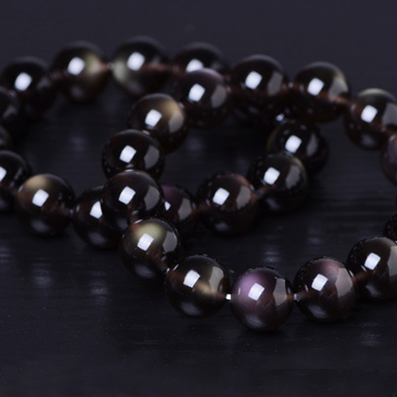 Pulsera positiva de obsidiana arcoíris natural con Buddha Stones