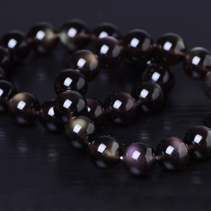 Pulsera positiva de obsidiana arcoíris natural con Buddha Stones