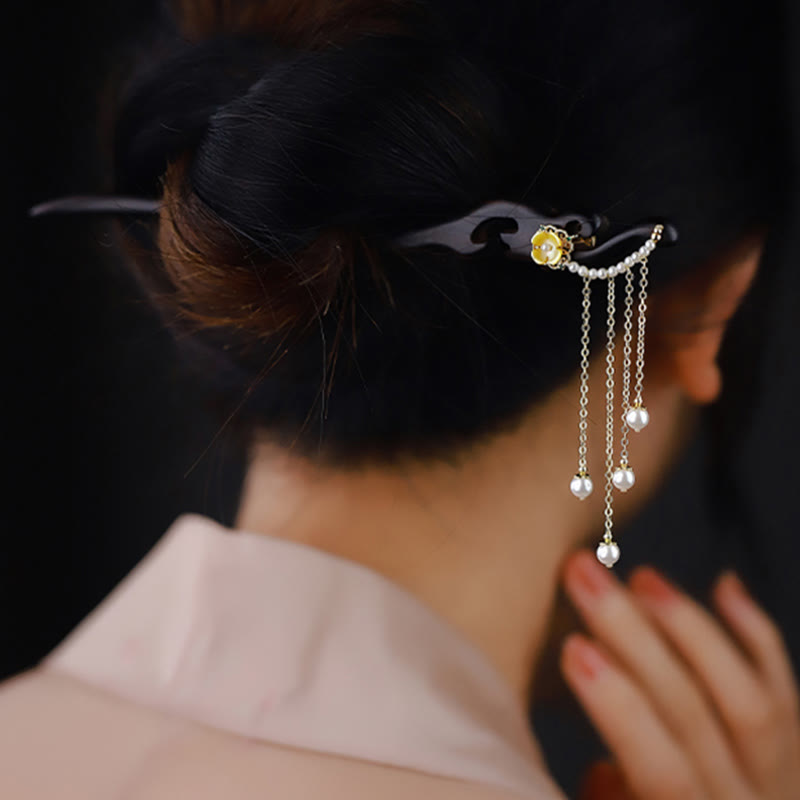 Horquilla con borlas de perlas y flores amarillas de madera de ébano con Buddha Stones