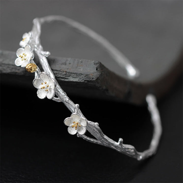 Pulsera ajustable con Buddha Stones de plata de ley 925 con flor de ciruelo y bendición