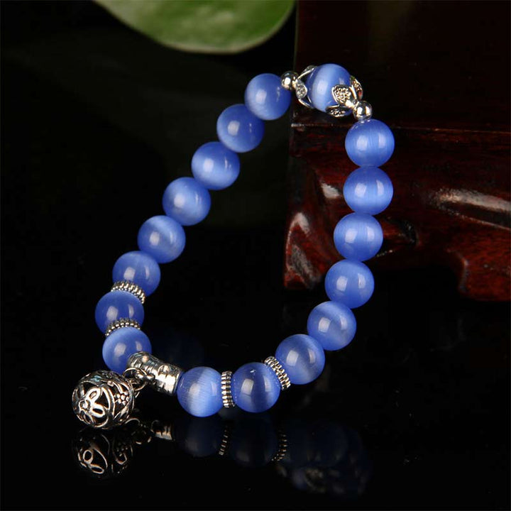 Pulsera de la suerte con ojo de gato tibetano y Buddha Stones