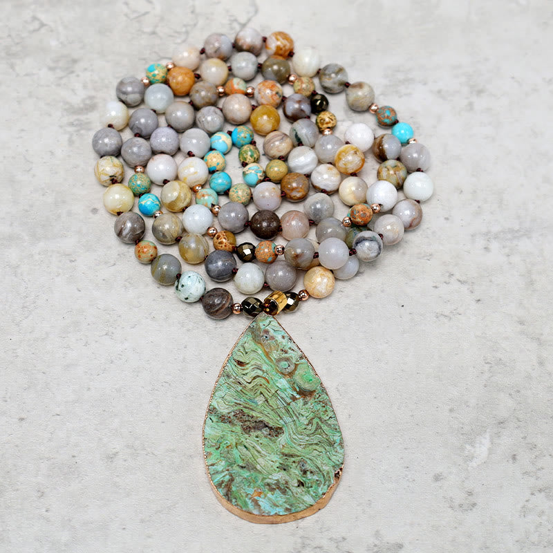 Collar curativo con cuentas de jaspe Picasso del océano natural de Buddha Stones