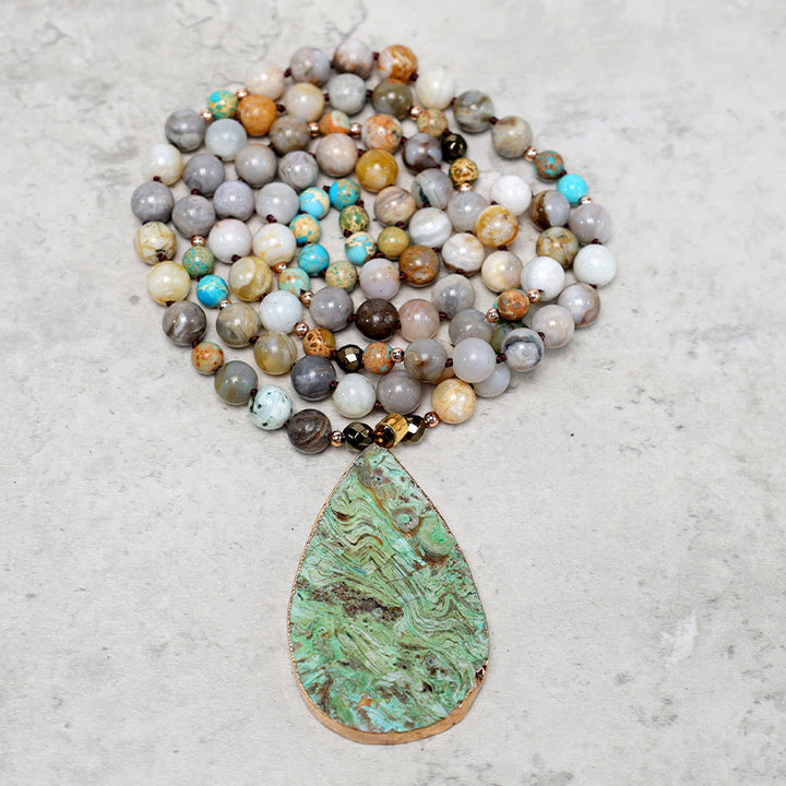 Collar curativo con cuentas de jaspe Picasso del océano natural de Buddha Stones