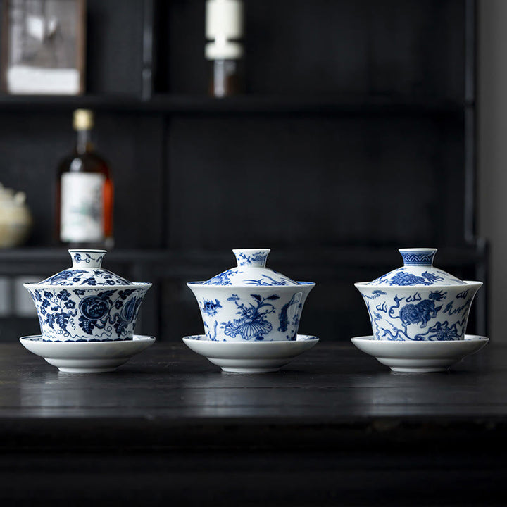 Buddha Stones Porcelana Azul Y Blanca Loto Pez Koi Danza Del León Sandía Cerámica Gaiwan Sancai Taza De Té Kung Fu Taza De Té Y Platillo Con Tapa 300ml