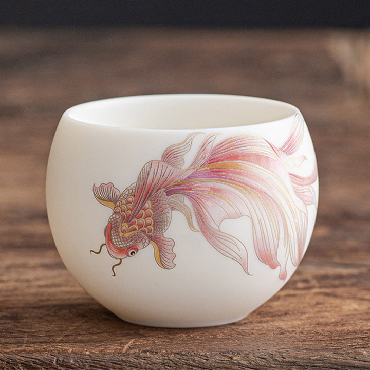 Taza de té de cerámica de porcelana blanca, pez Koi, Buddha Stones, taza de té de Kung Fu