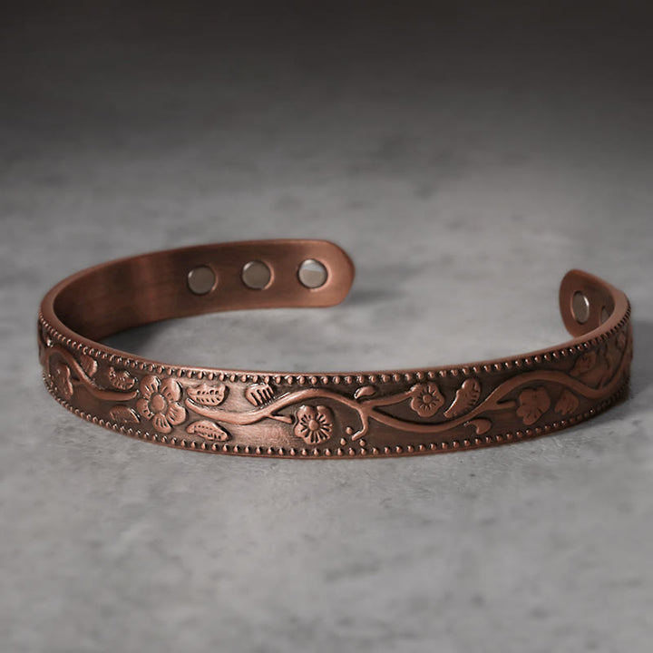 Brazalete ajustable de cobre magnético floral con Buddha Stones