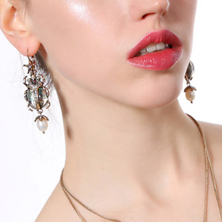 Pendientes colgantes con forma de calavera y escarabajo, estilo vintage, con perlas de cristal y escarabajo