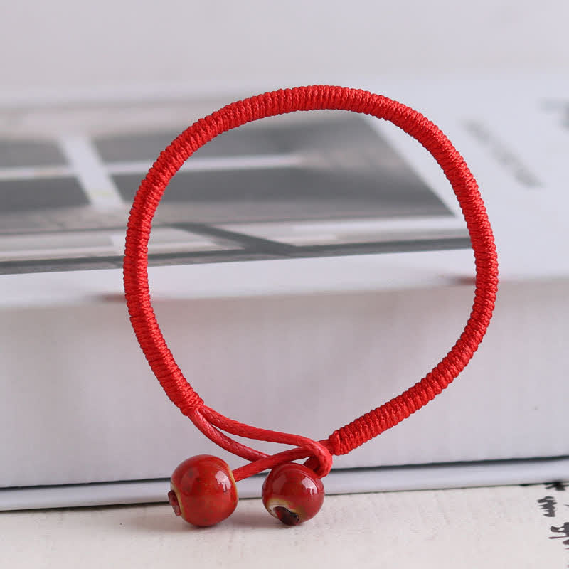 Pulsera de cerámica con hilo rojo de la suerte FengShui de Buddha Stones